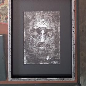Xilografia cara en negro