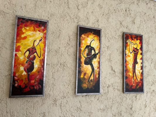 Trío de jazzistas en óleo